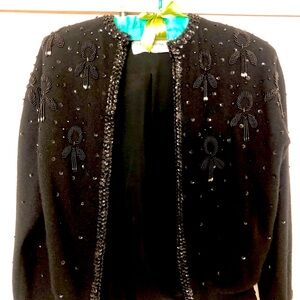 Beautiful vintage beaded sweater- him and eye closing- completely lined-